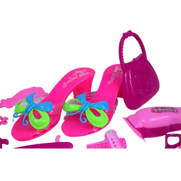 Set krásy s kaderníckymi doplnkami, topánkami a náušnicami v taške obrázok 3